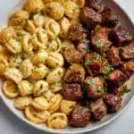 Cajun Steak Bites and Cheesy Garlic Shells Skillet Recipe