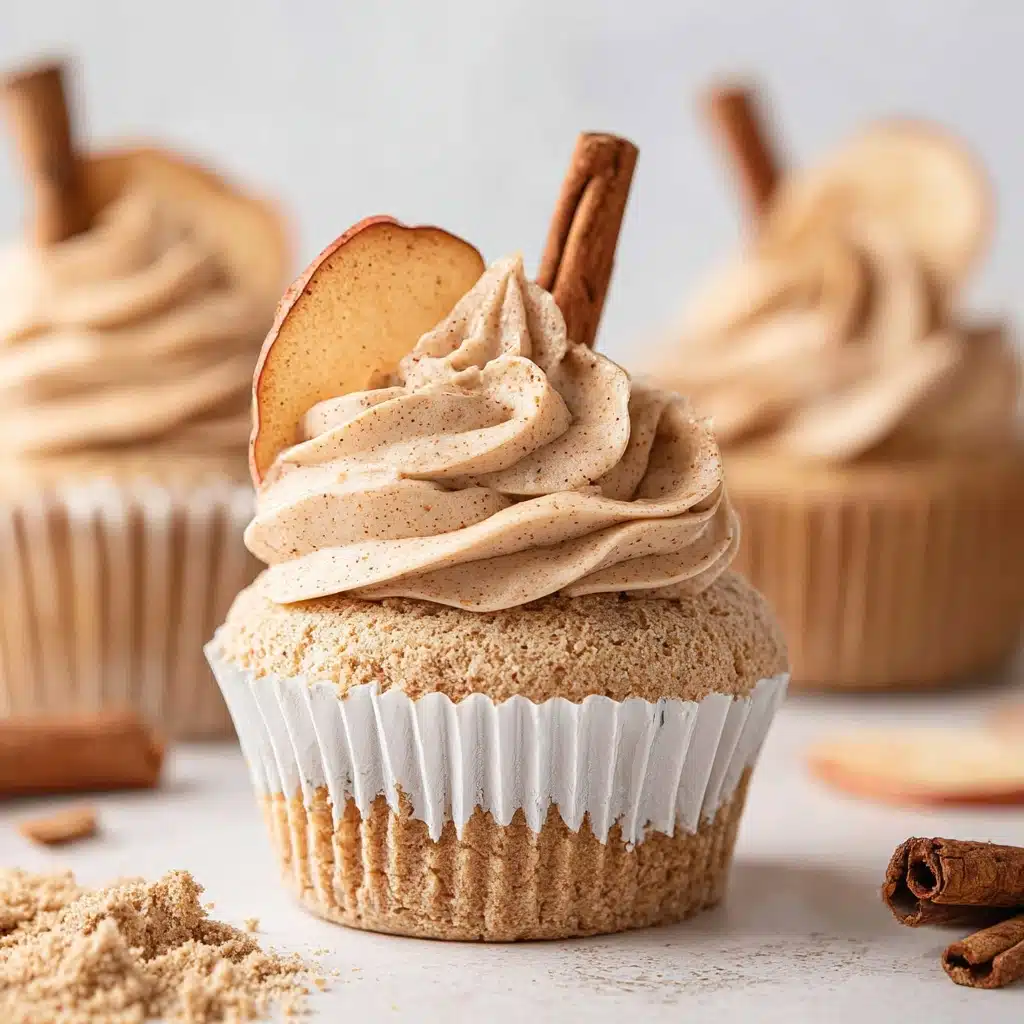Three vanilla cupcakes are lined up side by side on a rustic wooden surface. Each cupcake has a golden brown base with a slightly ridged texture from the baking liner. Atop each cupcake is a generous swirl of creamy beige frosting with a smooth yet slightly fluffy texture, piped high in a spiral pattern. The frosting is sprinkled with small pieces of light brown chopped nuts for garnish. In the foreground, scattered on the wooden surface, are whole pecan halves, adding a natural, earthy element to the composition. The background is softly blurred with a warm, neutral tone. photo taken with an iphone --v 7.0