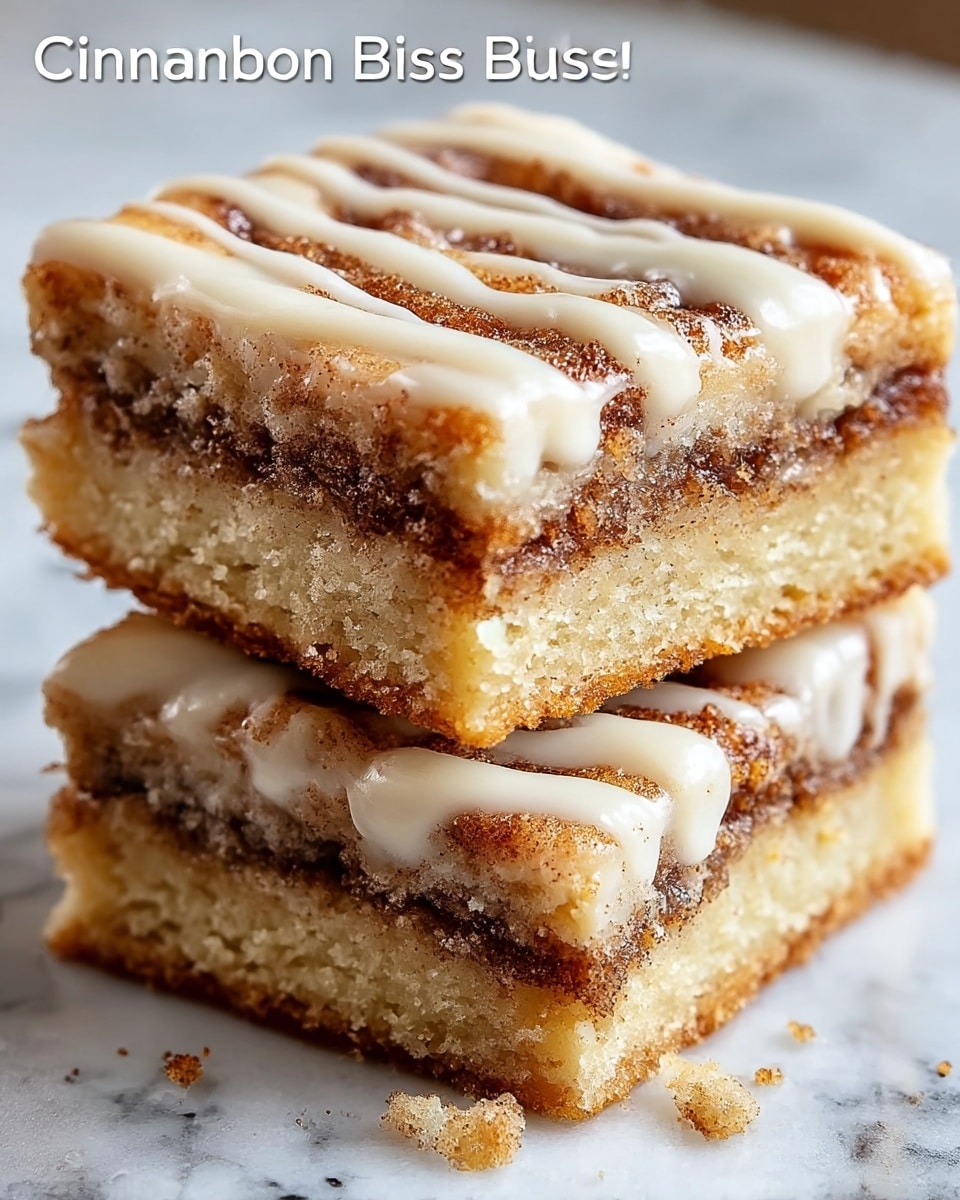 A close-up view of two square cinnamon roll bars stacked on top of each other. Each bar has three visible layers: a light golden-brown dough layer on the top and bottom with a soft, slightly crumbly texture, and a rich, dark brown cinnamon sugar filling layer in the middle. Swirls of creamy white glaze with a smooth, glossy texture are drizzled over the top of the bars, adding a sweet finish. The bars sit on a white marbled surface that contrasts with their warm colors. The image shows the moist, gooey texture inside the bars with a few crumbs scattered around. photo taken with an iphone --ar 4:5 --v 7